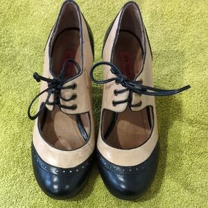 Miz Mooz Black and Tan Leather Lace-Up Booties.